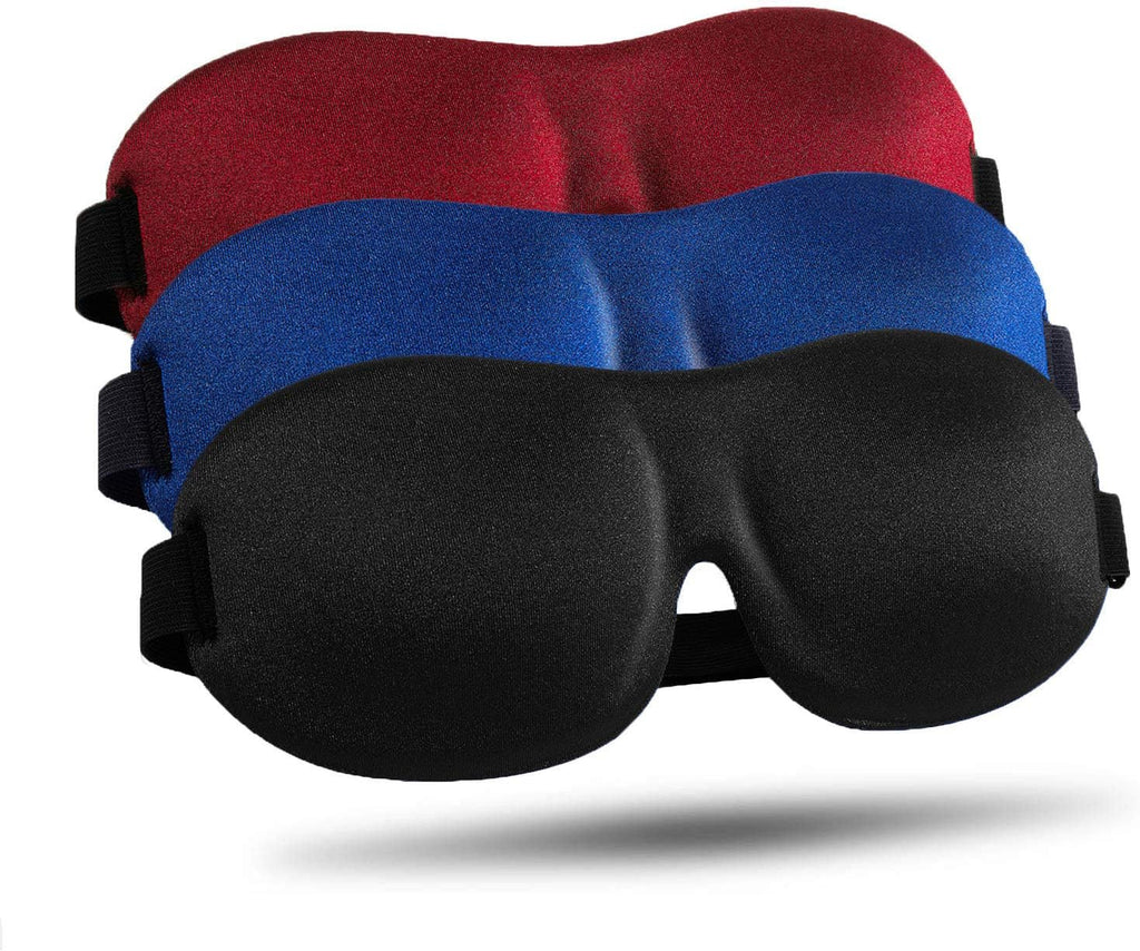 The Dream Serene Trio 3-piece luxury sleep set featuring red, blue, and black 3D contoured sleep masks with adjustable straps for light blocking.