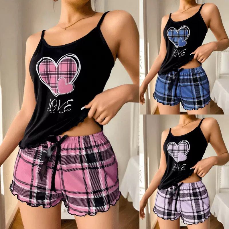 Black tank with plaid heart print and matching plaid shorts in pink and blue, trendy loungewear set for bedtime.