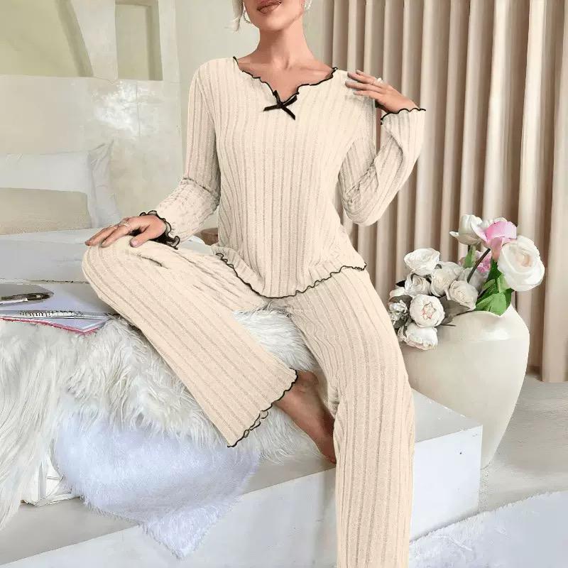 Beige ribbed long sleeve pajama set with black trim, ideal for cozy nightwear from Seductress Beauty's sleepwear collection.