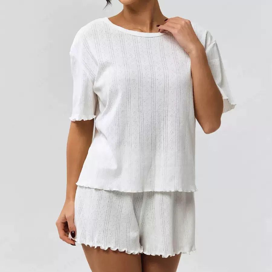 White short-sleeve pajama set with subtle stripe texture and lettuce hem, a lightweight and breezy sleepwear choice.