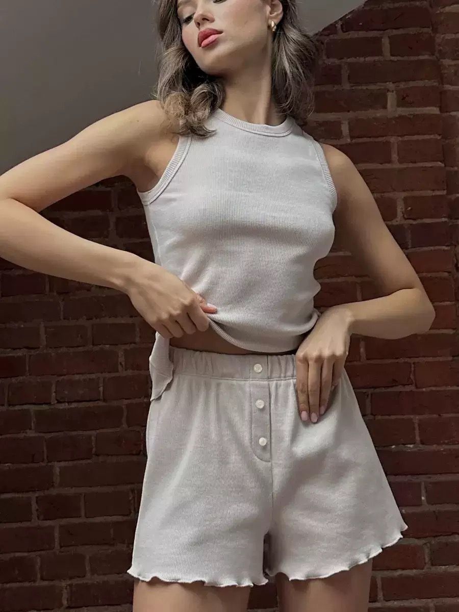 The Serenity Satin Set | Short-Sleeve Classic Sleepwear Model Walking in Loungewear