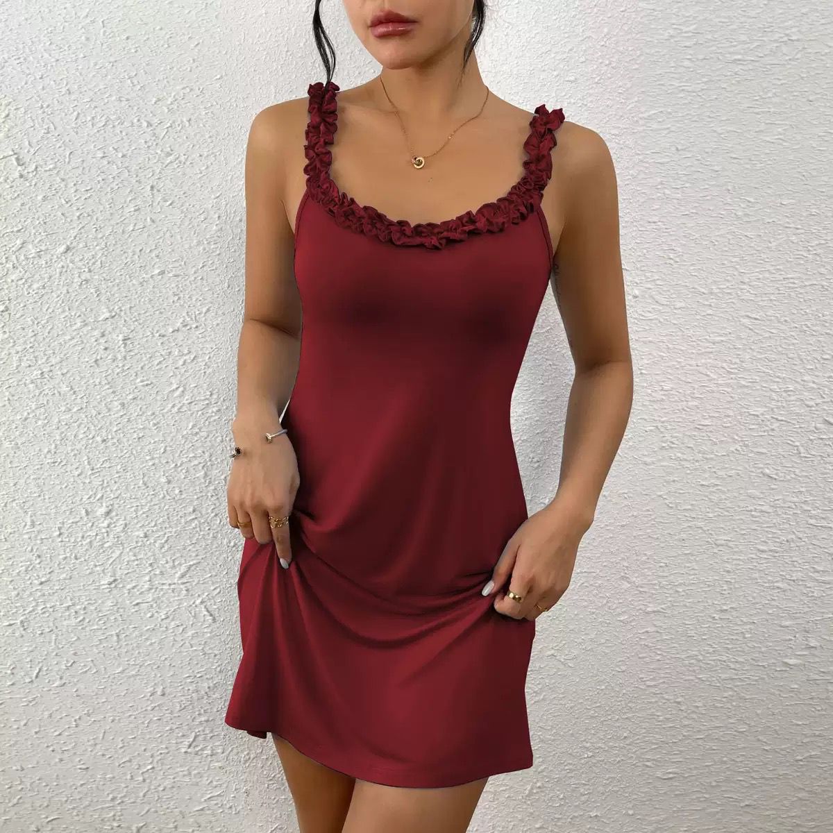 The Aria Romantique burgundy nightdress with ruffled neckline. A soft and elegant lace-trimmed loungewear piece for nighttime comfort.