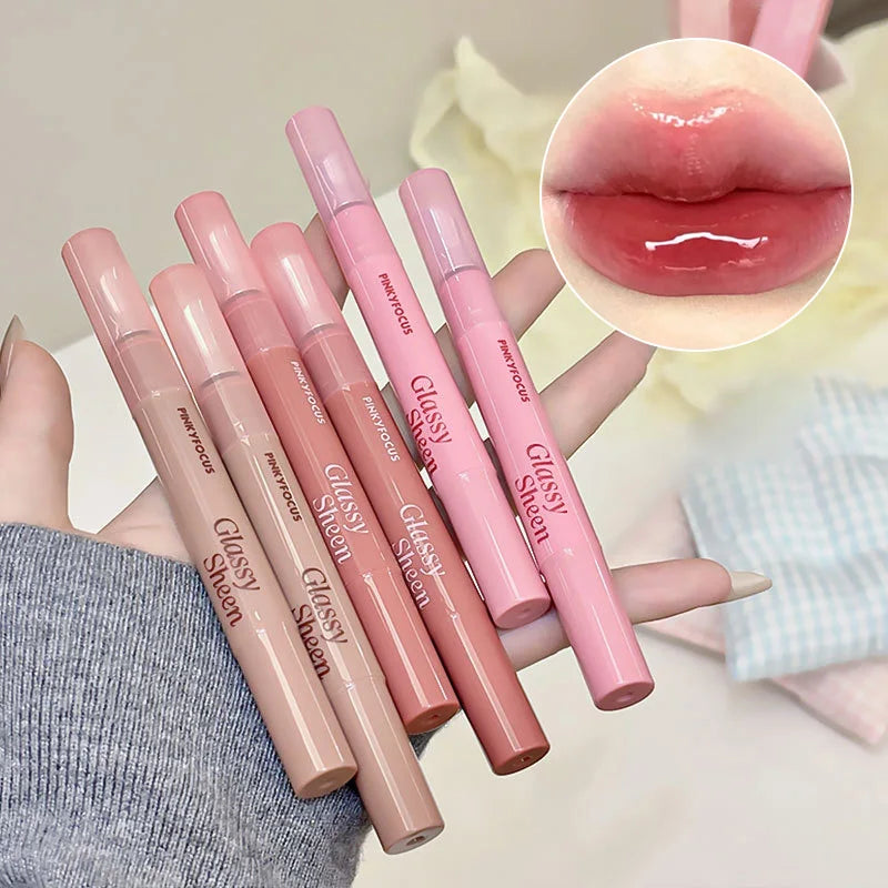 Pinkyfocus Lip Gloss Is Moisturizing, Natural, Easy to Apply, Has a Water-Gloss Finish, Does Not Stick to the Cup, Does Not Show Lip Lines, Is Non-Sticky, Enhances Lip Volume, Brightens the Complexion, High-End Versatile Kore